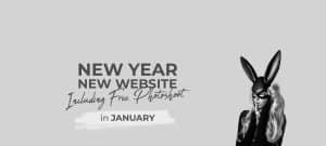 Promotional banner featuring a model with a bunny mask, hinting at a secret with a finger over her lips, alongside text advertising a New Year website launch with a free photoshoot offer in January.